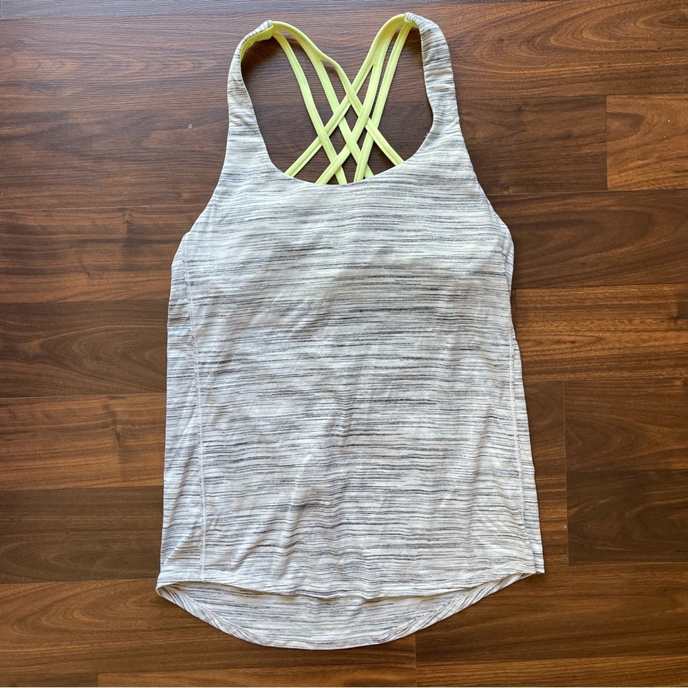 Gray Lululemon tank top with padded sports bra.